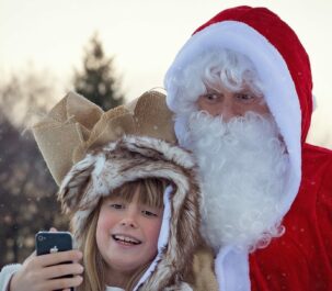 bambina con babbo natale